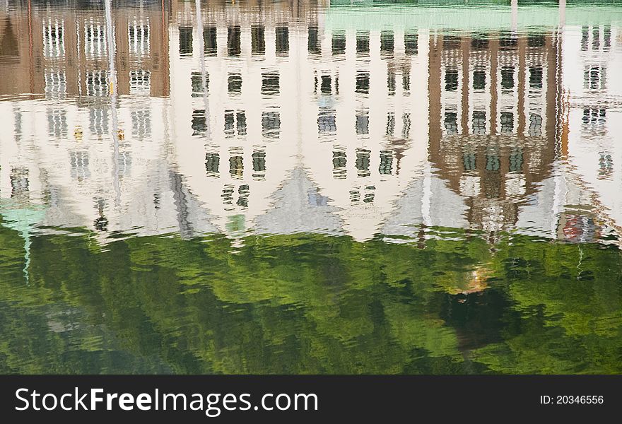 Reflections of Bryggen houses on the sea, in Bergen, Norway. Reflections of Bryggen houses on the sea, in Bergen, Norway