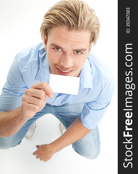 Happy Blond Man With Giving Card