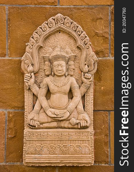 Handicraft on brick wall at Thai temple countryside of Thailand