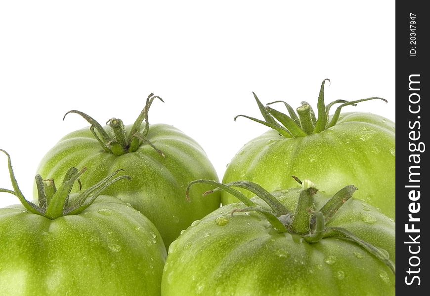 Green tomatoes are shown in the picture. Green tomatoes are shown in the picture.