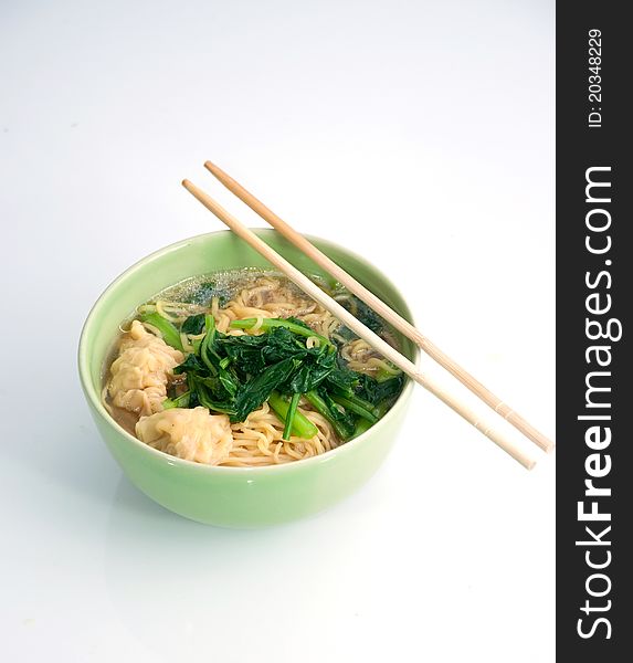 Chinese noodle soup and chopsticks