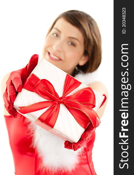 Beautiful woman showing a gift. Beautiful woman showing a gift