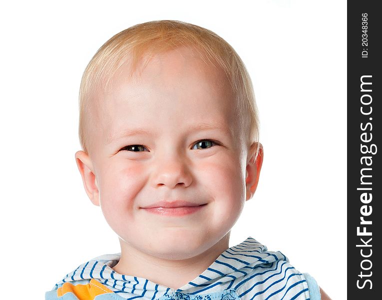 Little boy close up on white background