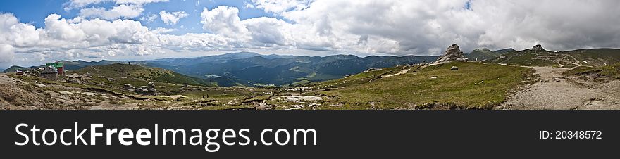 Panorama background in Carpathians. Beautiful montains and landscape in Romania.