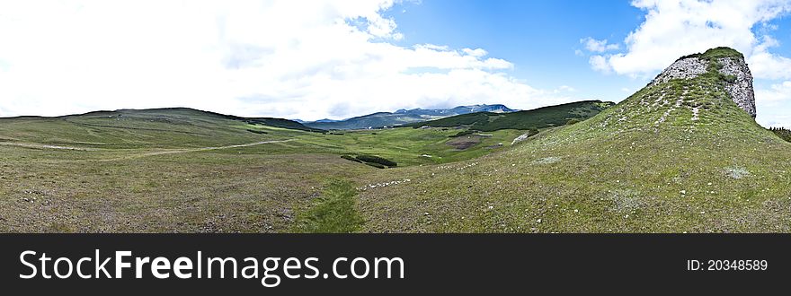 Panorama background in Carpathians. Beautiful montains and landscape in Romania.