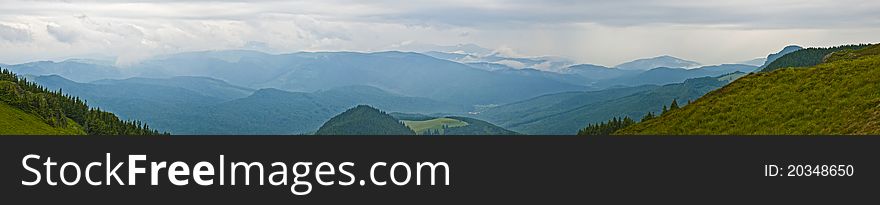 Panorama background in Carpathians. Beautiful montains and landscape in Romania.