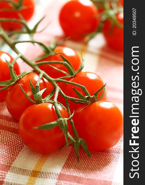 Fresh cherry tomatoes on napkin - food ingredient