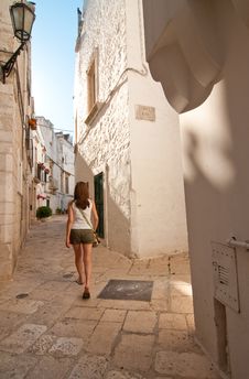 Girl In A Narrow Street Royalty Free Stock Photo