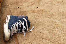 A Sneaker In The Sand Stock Photography A Sneaker In The Sand Stock Photography