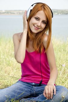 Redhead Girl With Headphone Stock Photography Redhead Girl With Headphone Stock Photography