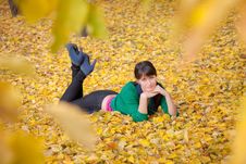 Girl Resting On Yellow Autumn Leaves Royalty Free Stock Images Girl Resting On Yellow Autumn Leaves Royalty Free Stock Images