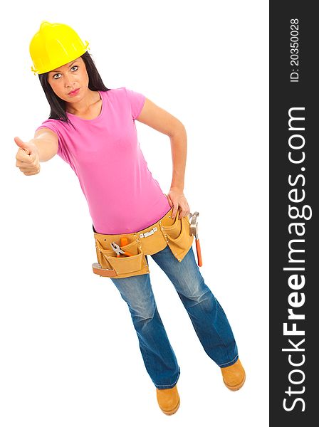 A young female dressed in blue jeans and pink top  and yellow hard hat and tool belt. A young female dressed in blue jeans and pink top  and yellow hard hat and tool belt