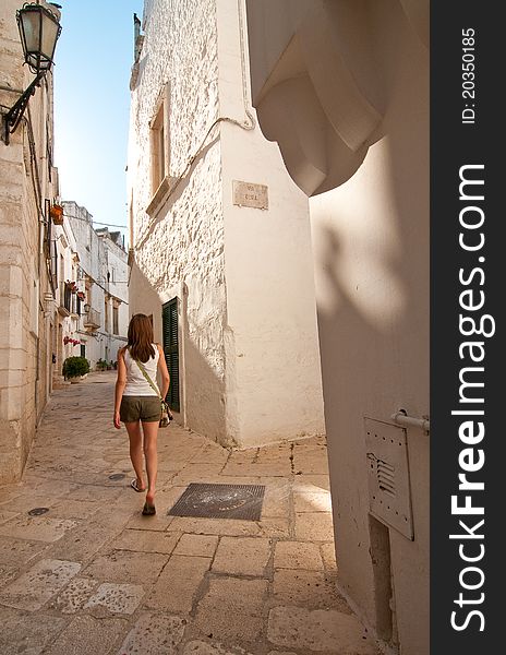 Girl in a narrow street