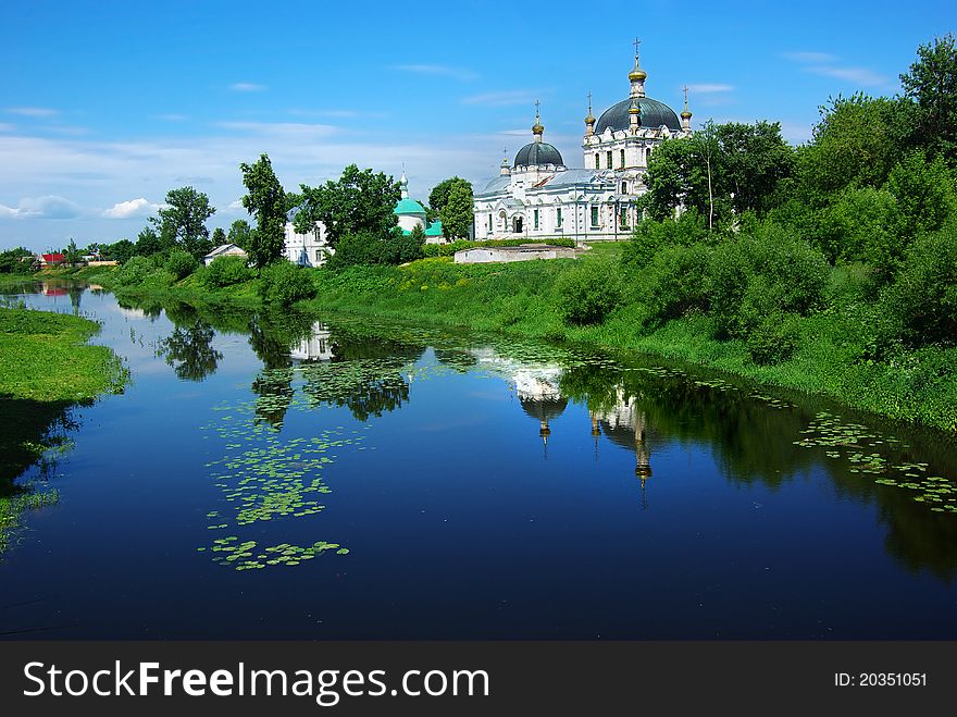 Picturesque Russian landscape with church.