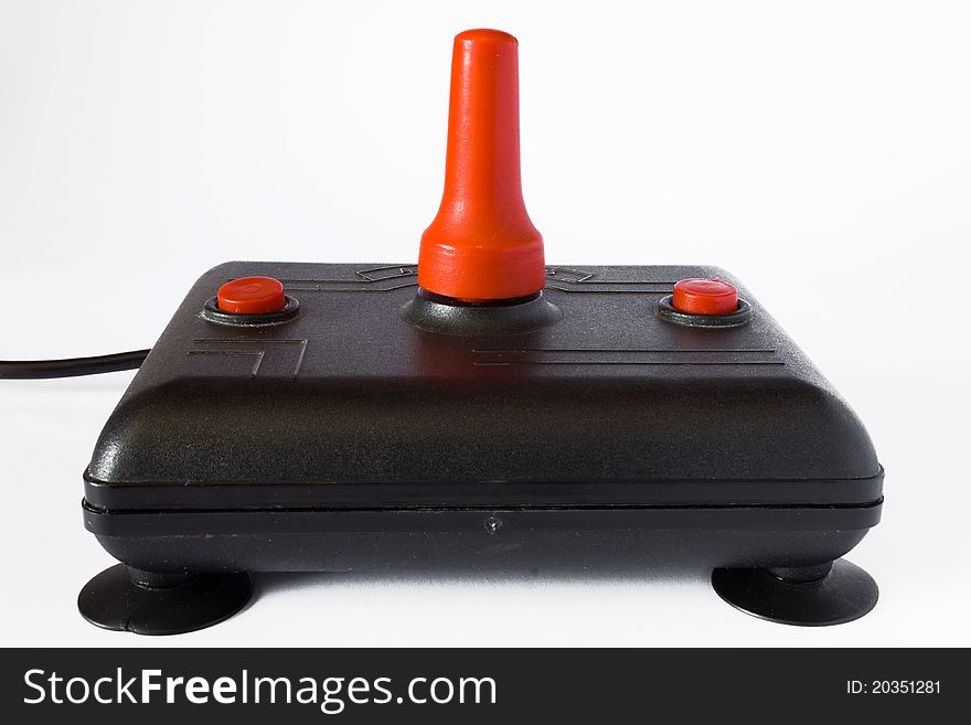 Old joystick for computer, red and black color