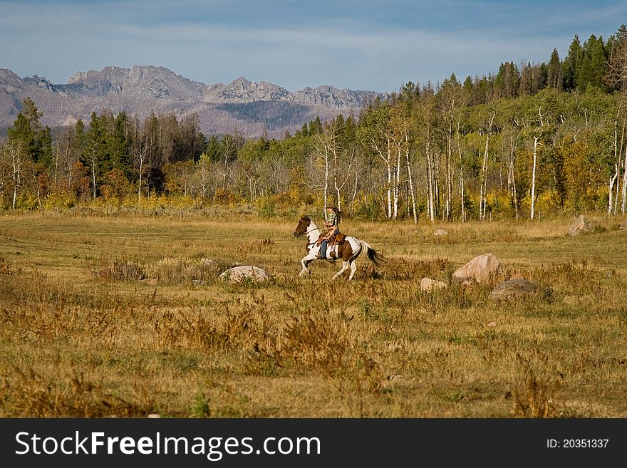 Woman Riding Horse