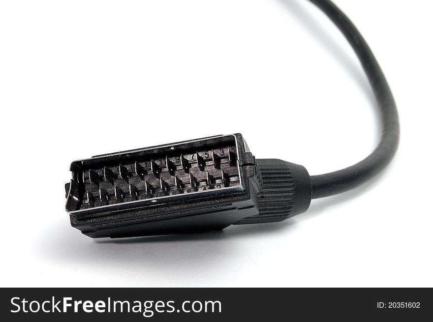 An isolated scart plug on a white background