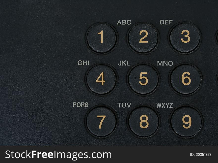 Black round phone buttons with letters