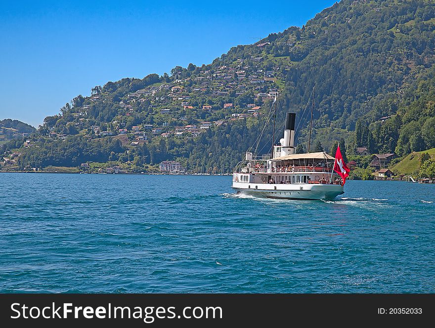 Steam boat cruising swiss lake