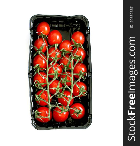 Tomatoes In Plastic Packing Isolated On White