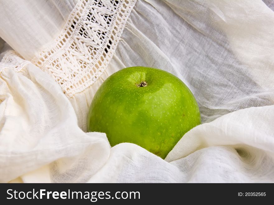 Green apple on the cotton