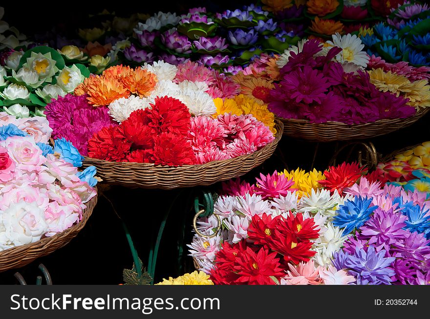 Baskets of colorful flowers