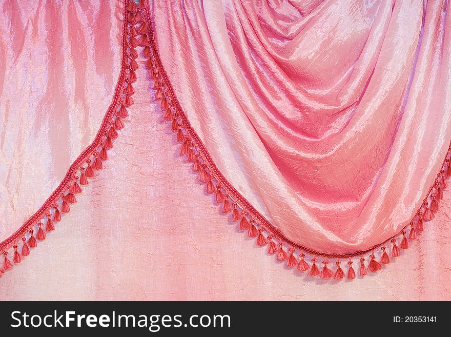 Details of pink curtain with tassels. Details of pink curtain with tassels