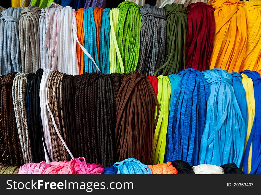 Colorful shoelaces hanging for sale