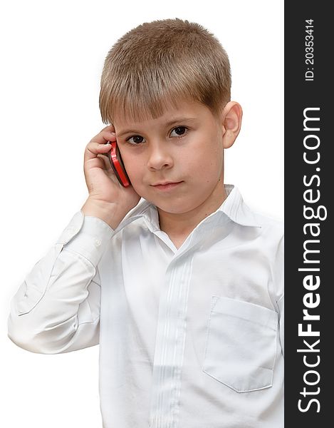 A boy with a cell phone. Isolated on white background