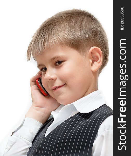 A boy with a cell phone. Isolated on white background