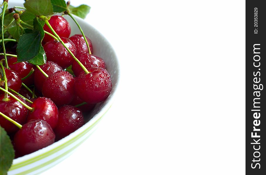 Bowl full of ripe cherries, isolated. Bowl full of ripe cherries, isolated