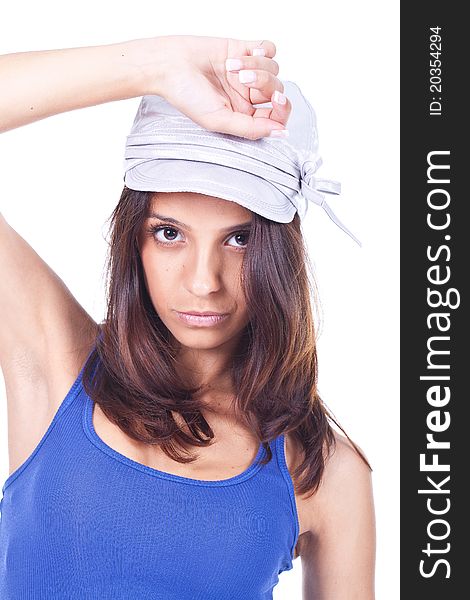 Beautiful woman wearing a silver hat and posing. Beautiful woman wearing a silver hat and posing