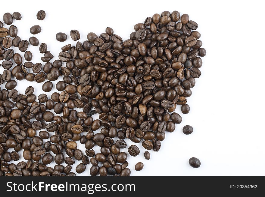 Coffee beans forming shape of heart. Coffee beans forming shape of heart