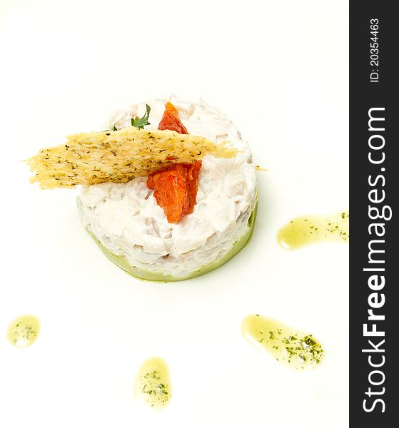 Chicken appetizer on white plate