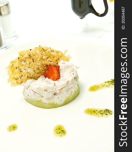 Chicken appetizer on white plate