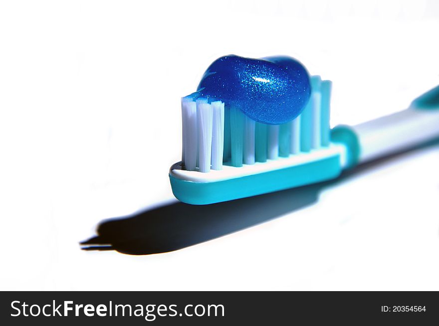 Macro photo of toothbrush in a solid white background. Macro photo of toothbrush in a solid white background