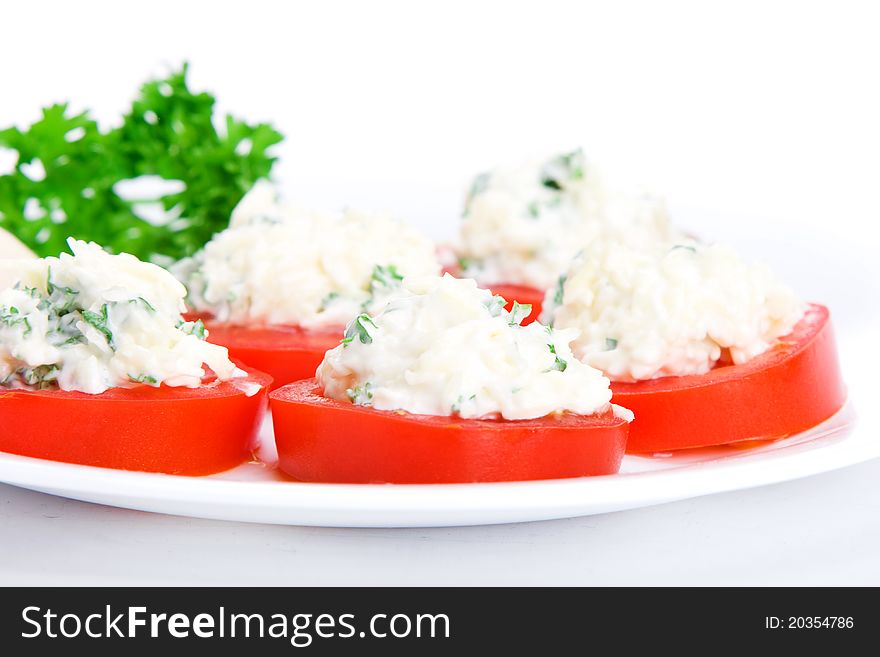 Sliced tomato with cheese sauce