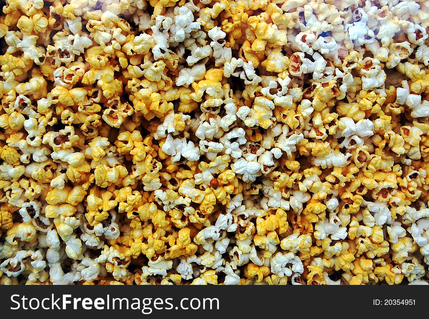 An image of popcorn behind glass