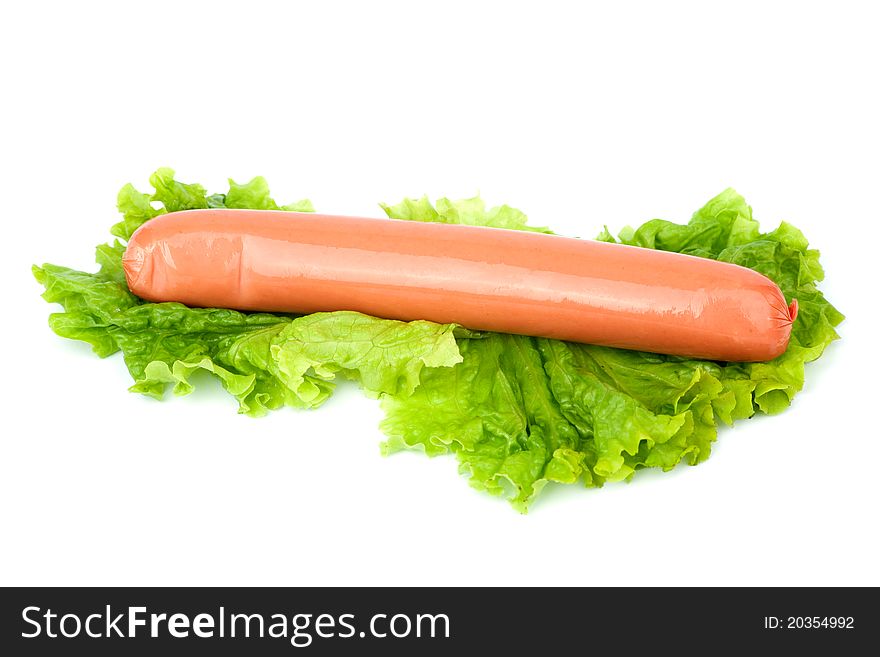 Bulgarian chicken Sausage arranged with lettuce isolated on white background