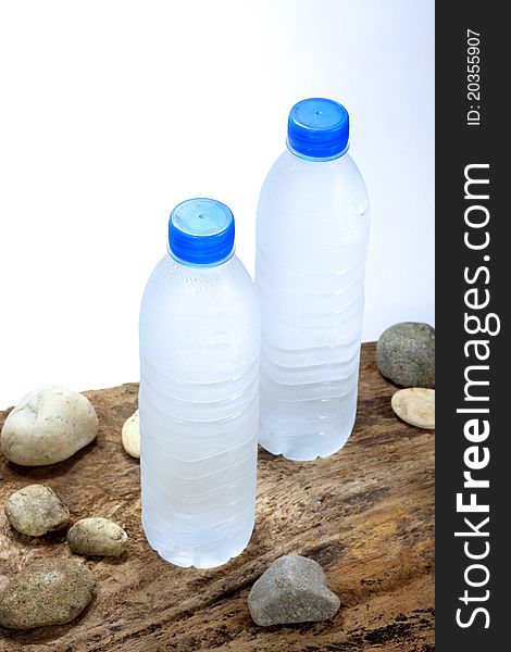Cold water bottles on wood