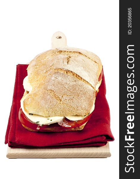 Sandwich caprese with mozzarella and tomato slice