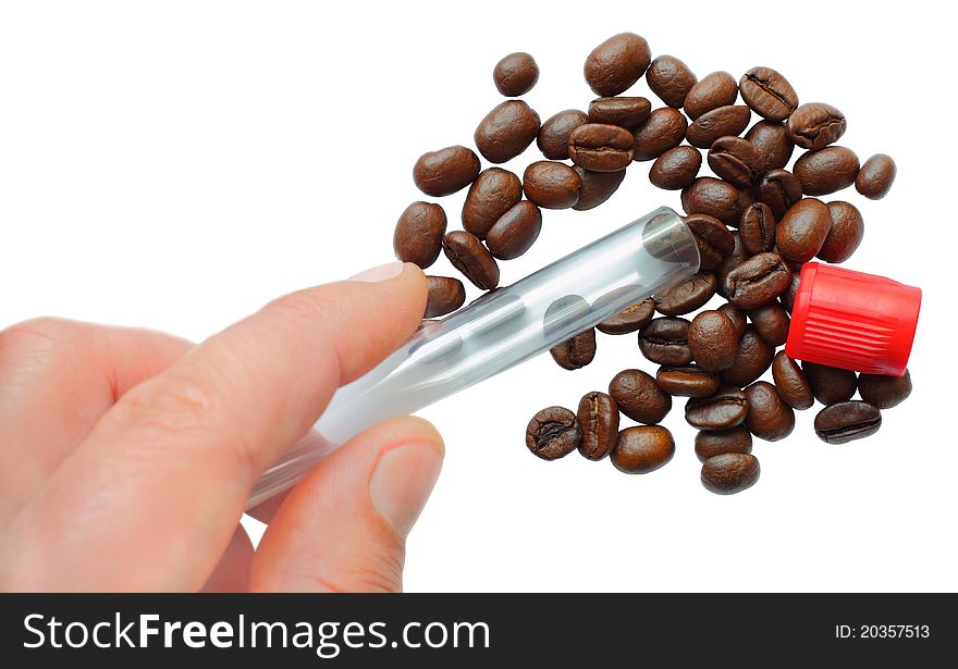 Isolated photo depicting emptying the coffee beans out of the tube;. Isolated photo depicting emptying the coffee beans out of the tube;
