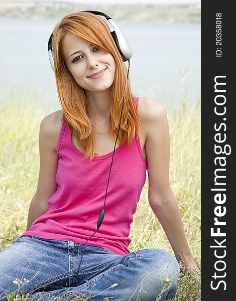 Redhead Girl With Headphone