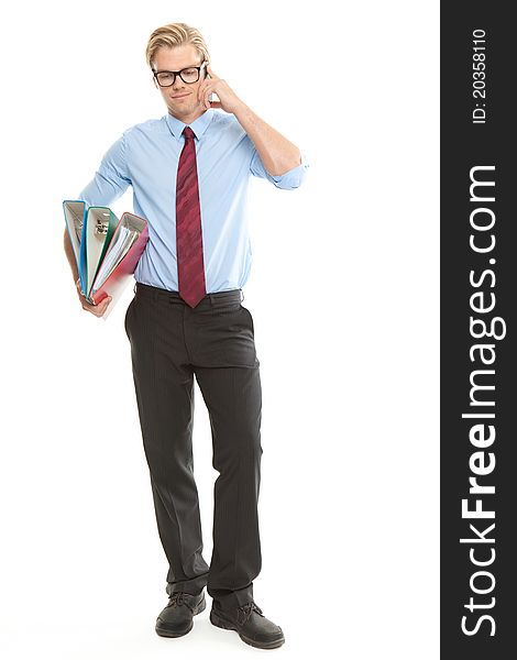 Businessman with mobile phone and folders. Businessman with mobile phone and folders