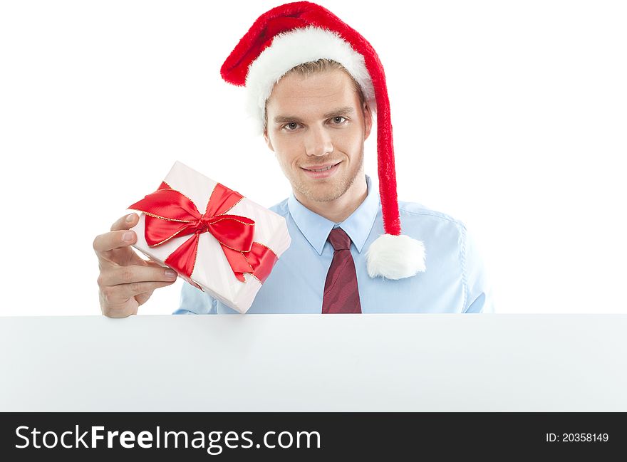 Young man holding a gift. Young man holding a gift