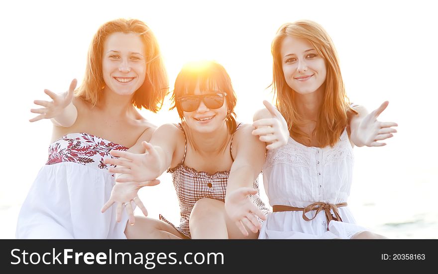 Portrait Of Three Beautiful Girls At The Beach.