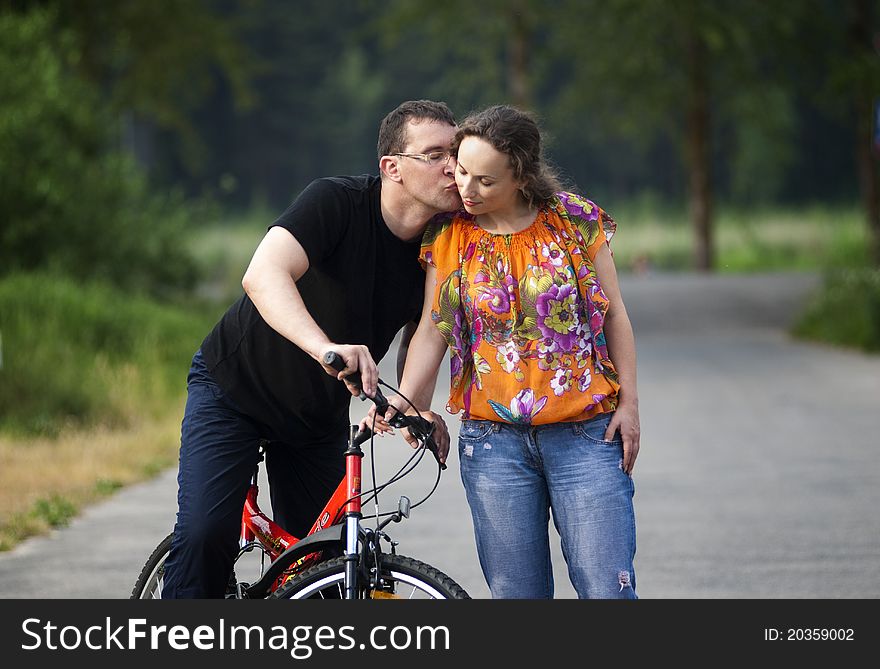 Happy Couple At Bicycle