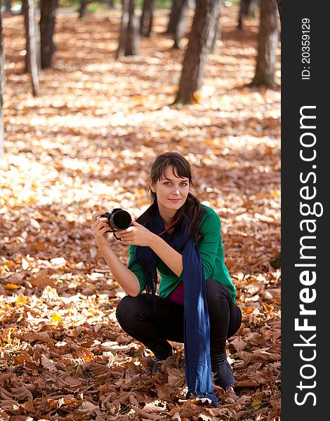 Autumn landscape. beautiful young girl resting in yellow autumn leaves. Autumn landscape. beautiful young girl resting in yellow autumn leaves