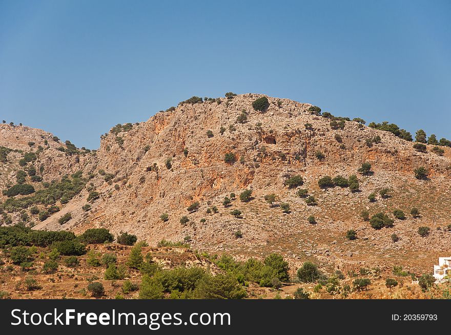 Typically hill of dry coastal regions, Rhodes, Greece. Typically hill of dry coastal regions, Rhodes, Greece