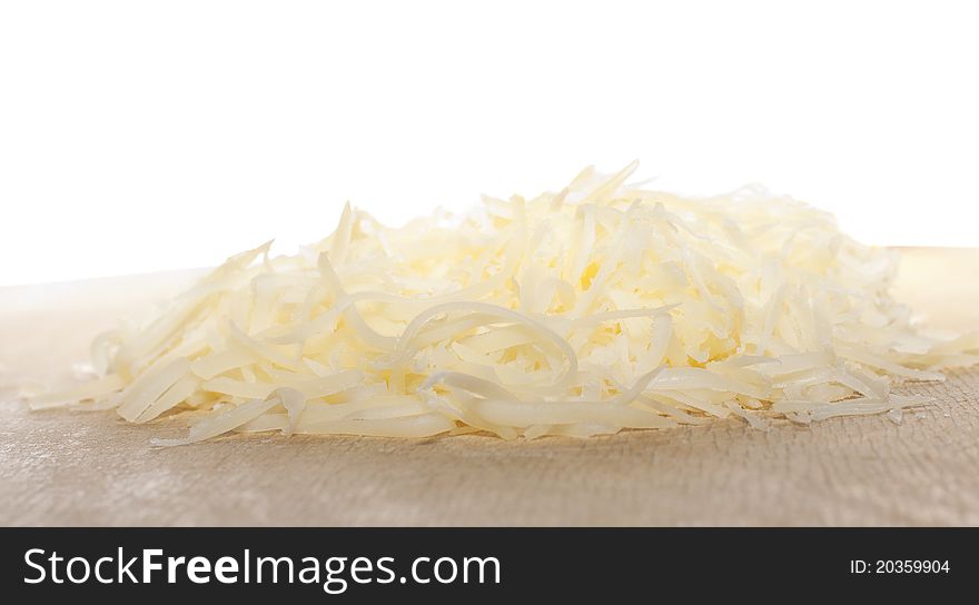 Grated cheese isolated on white background